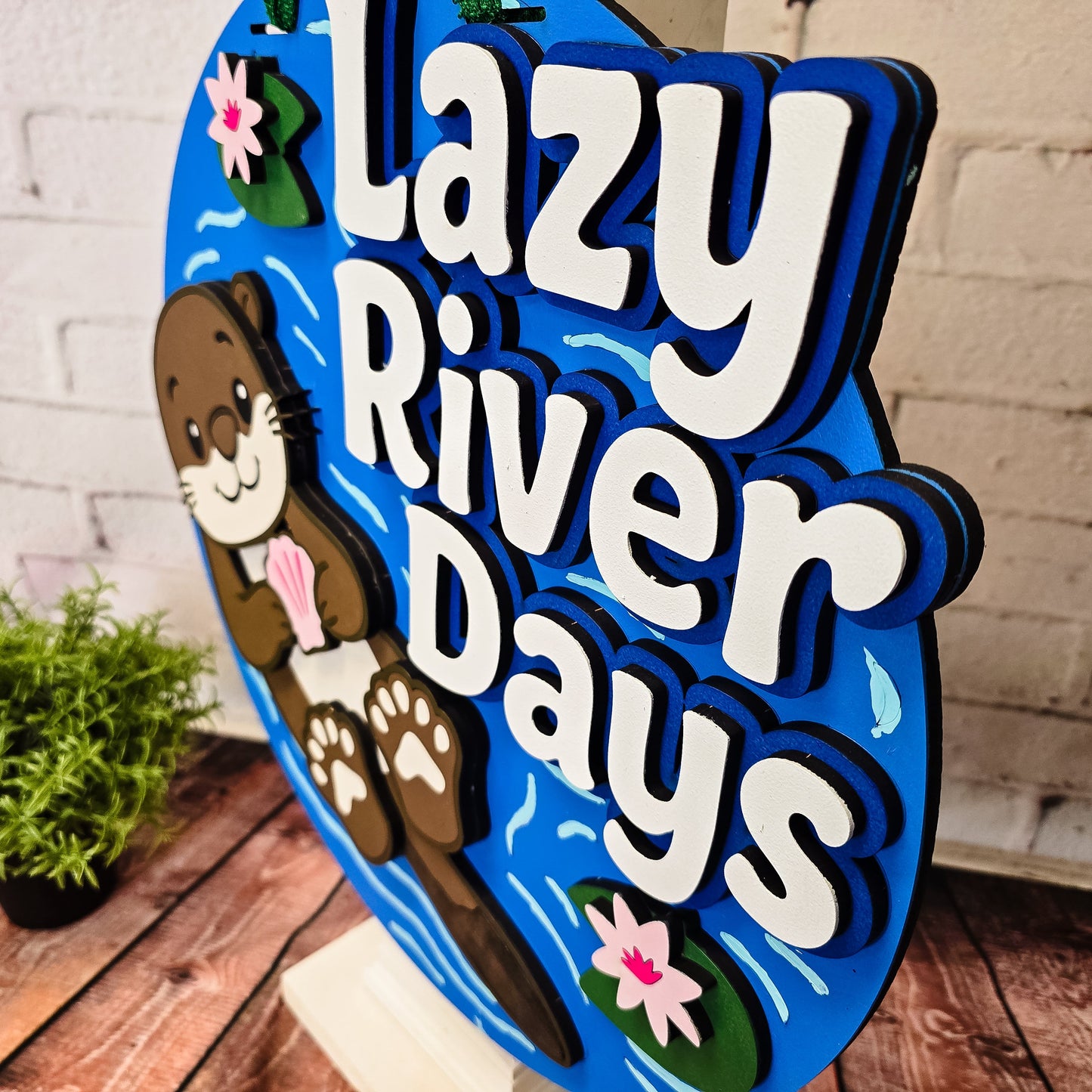 Lazy River Days Otter Door Hanger